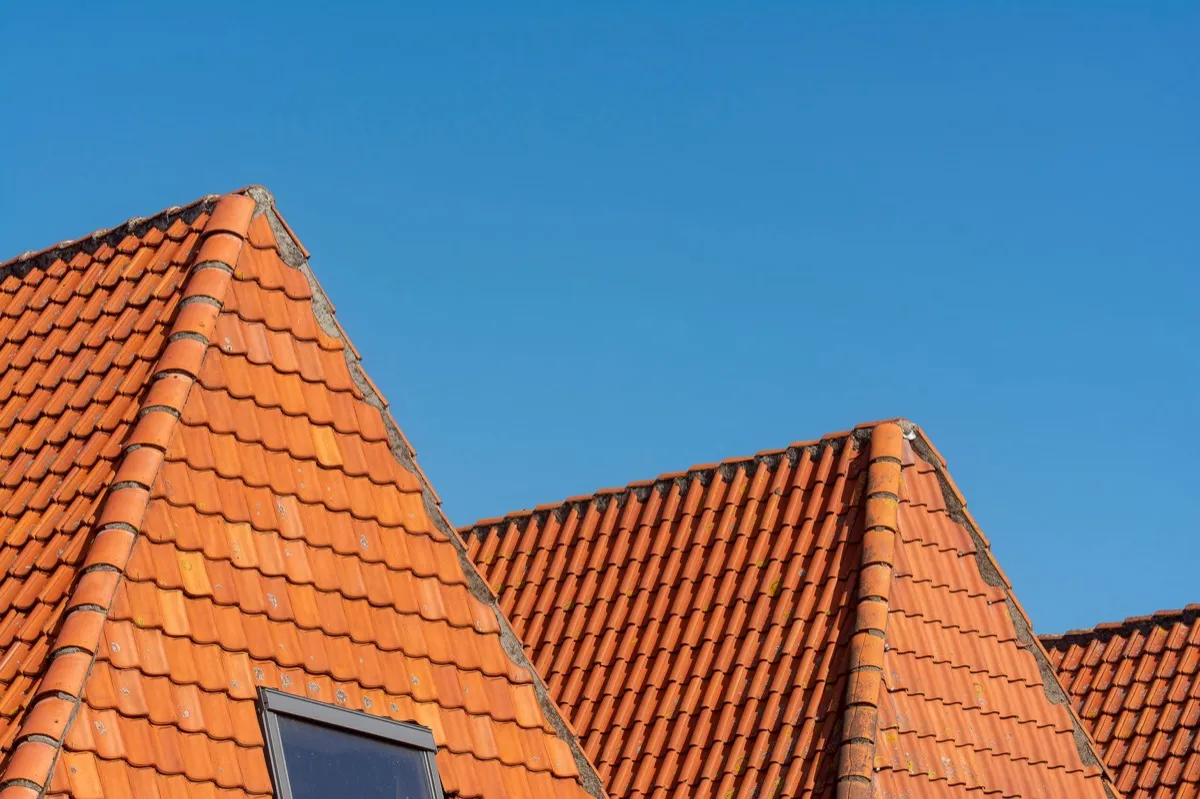 Clay barrel tile rooflines on homes in Springdale, AR